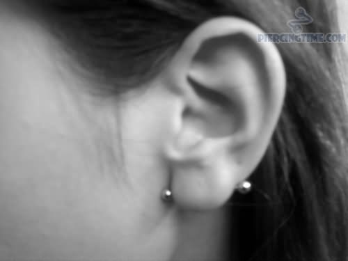 Awesome Silver Barbell Transverse Lobe Piercing For Girls