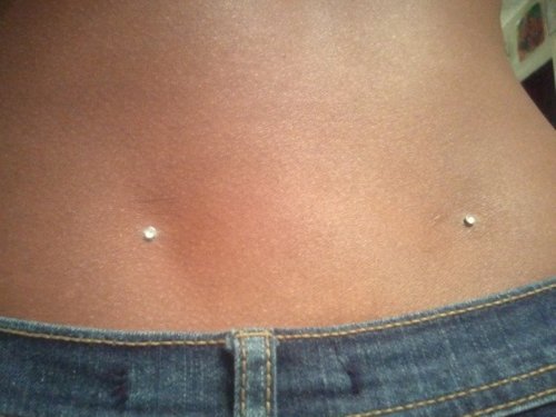 Back Dimple Piercing With Diamond Studs