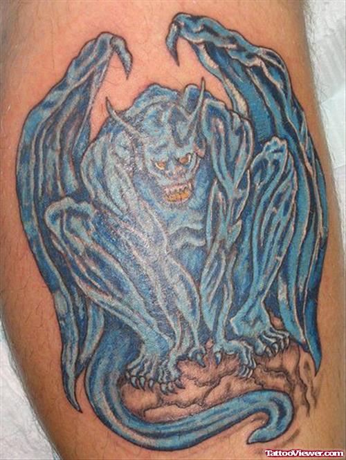 Black And Blue Gargoyle Tattoo Design