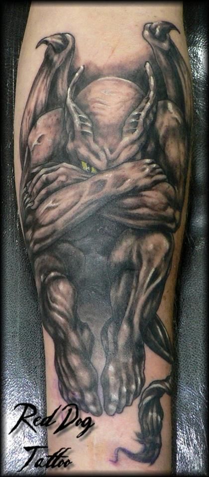 Black And Grey Gargoyle Hiding Face Tattoo Design For Forearm By Mr Red Dog