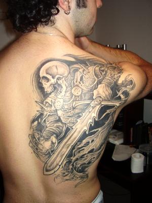 Black And Grey Grim Reaper Tattoo On Man Right Back Shoulder