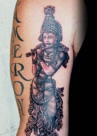 Black And Grey Lord Krishna Hinduism Tattoo On Half Sleeve