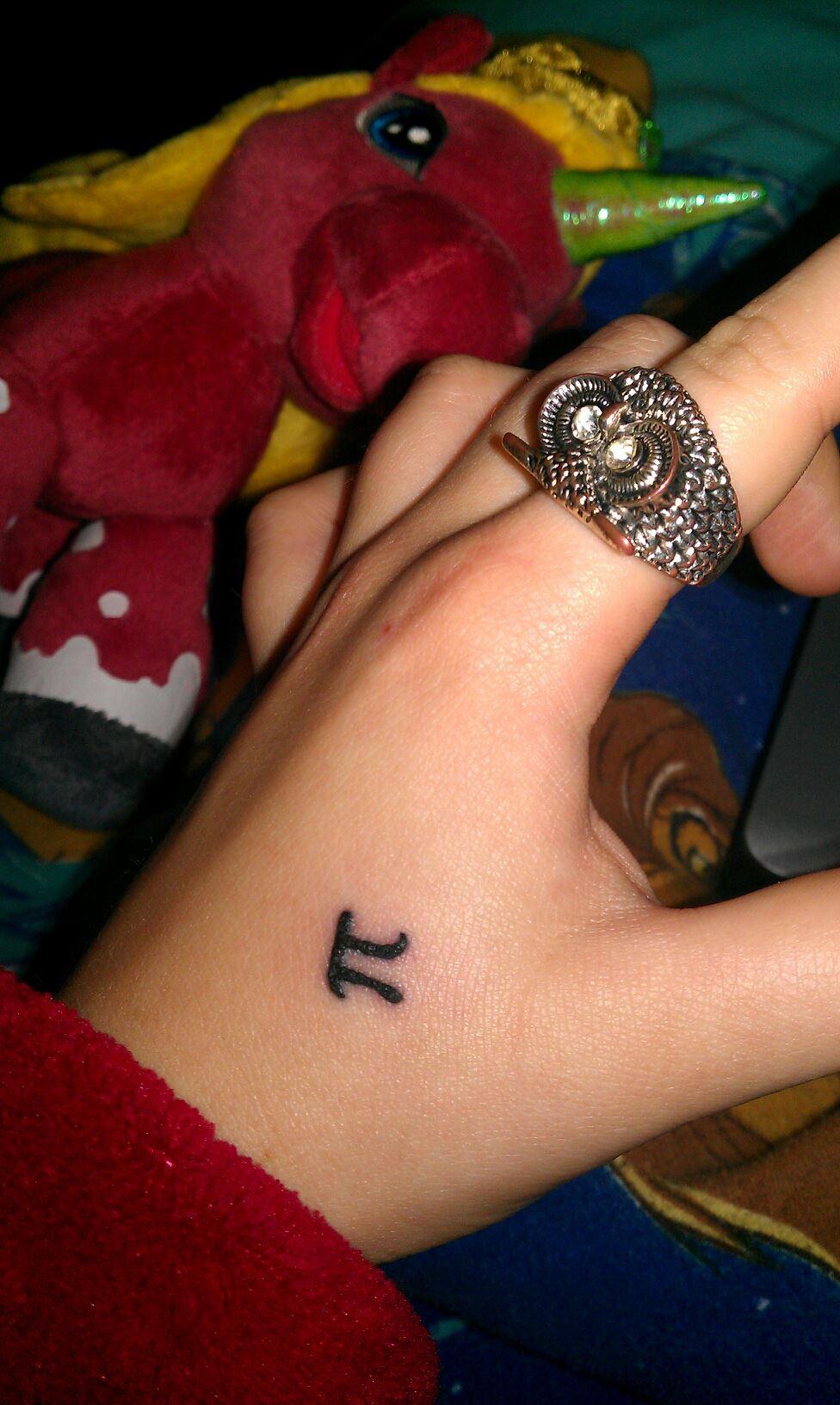 Black Little Pi Tattoo On Hand