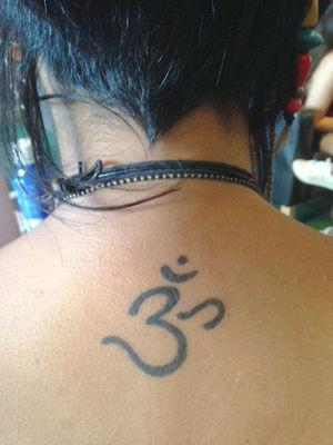 Black Om Hinduism Tattoo On Upper Back