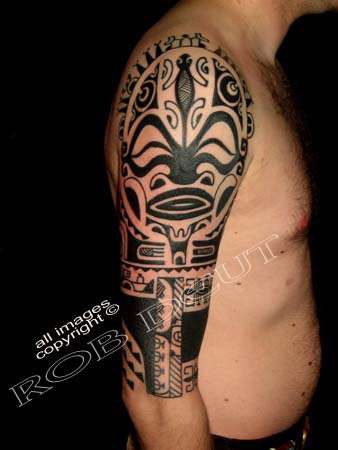 Black Tribal Tiki Tattoo On Half Sleeve