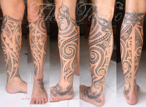 Black Tribal Tiki Tattoo On Leg