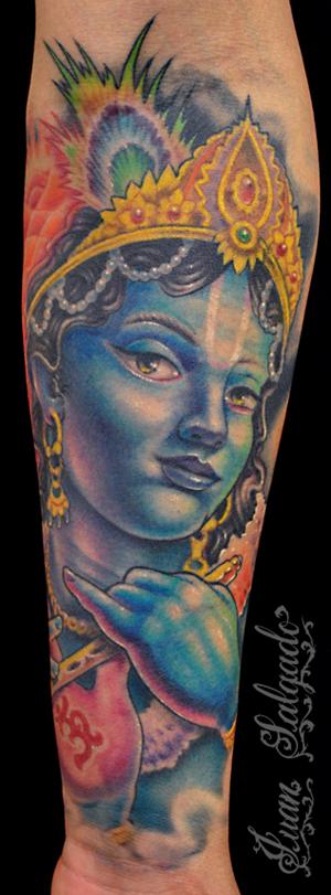 Colorful 3D Lord Krishna Hinduism Tattoo On Forearm By Jaun Salgado