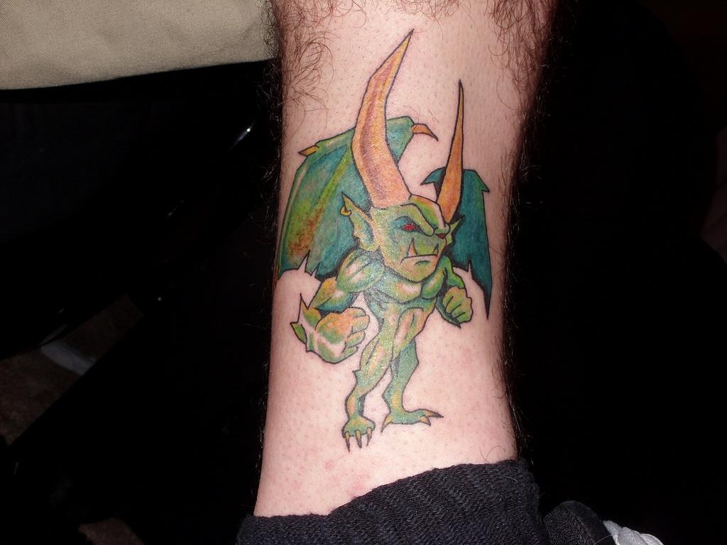 Colorful Gargoyle Tattoo On Leg