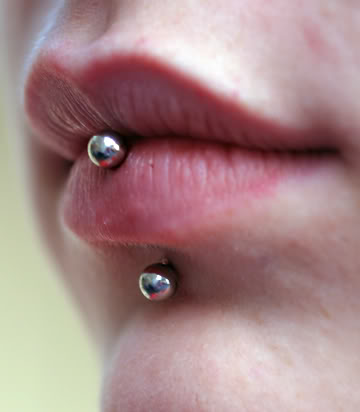 Corved Barbell Vertical Labret Piercing Closeup Picture