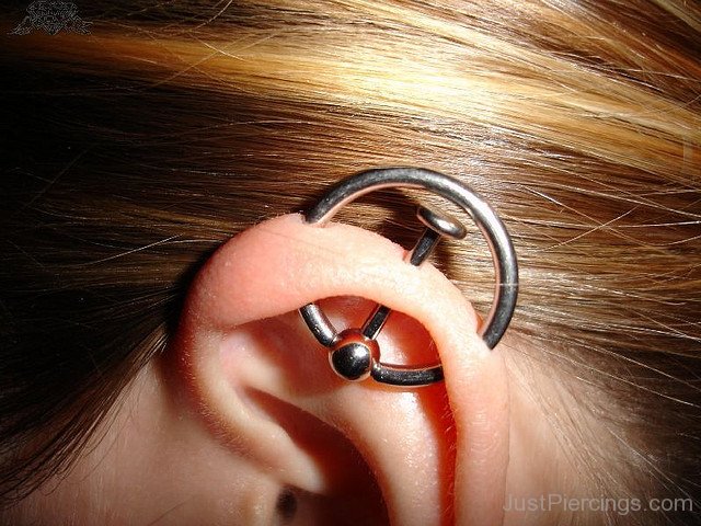 Ear Project Orbital Piercing On Girl Left Ear