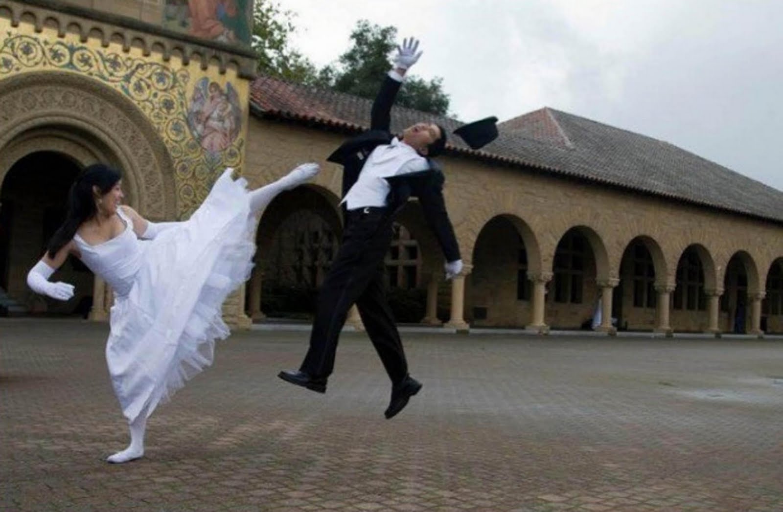 Funny Bride Kicking Groom