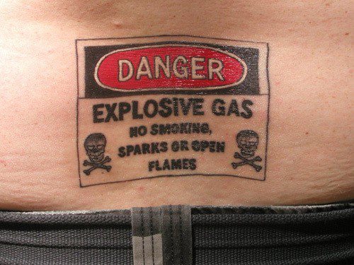Funny Danger Explosive Gas Tattoo On Lower Back