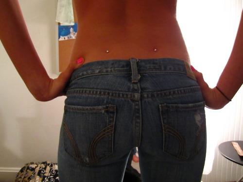 Girl Have Dimple Back Piercing Picture