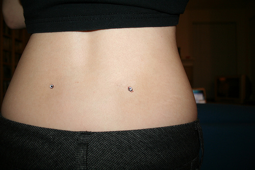 Lower Back Dimple Piercing For Young Girls
