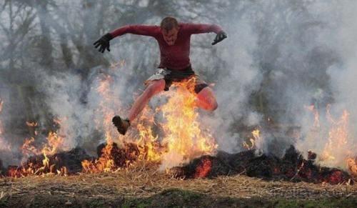 Man Funny Jump In The Fire