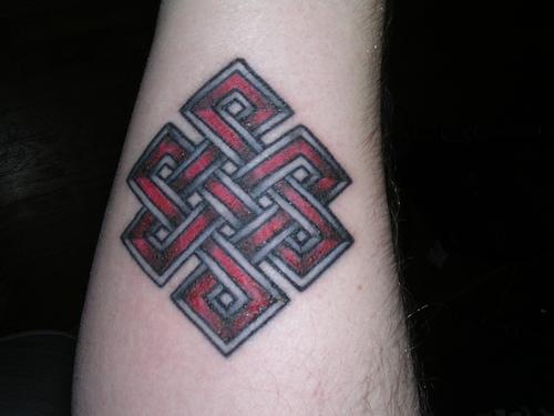 Red And Black Buddhist KnotTattoo Design For Forearm