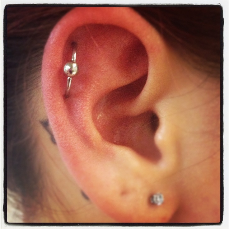Right Ear Lobe and Orbital Piercing