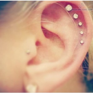 Scapha Ear Piercing With Diamond Anchors