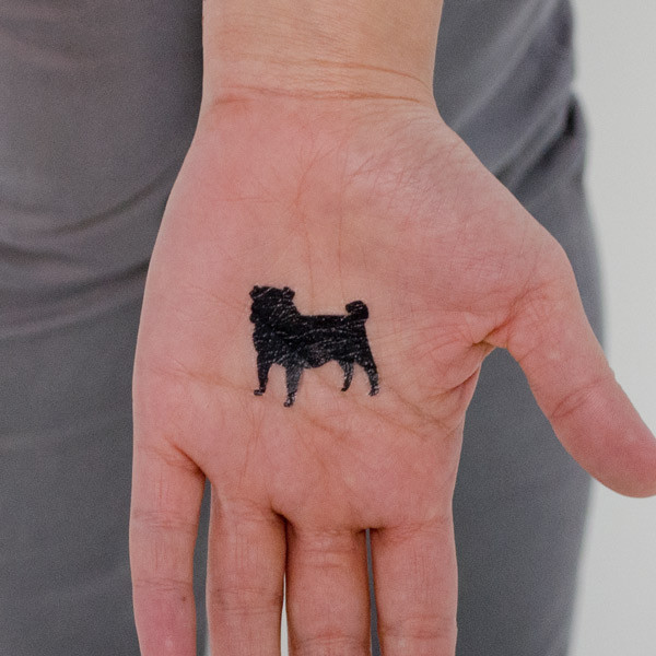 Silhouette Little Pug Dog Tattoo On Hand Palm
