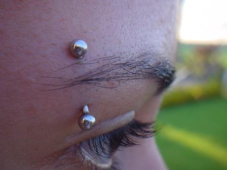 Silver Barbell Eyebrow Piercing For Young Girls