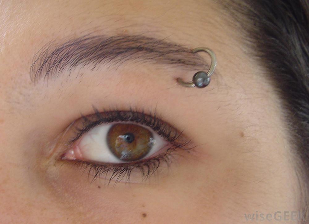 Silver Bead Ring Eyebrow Piercing