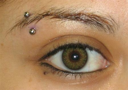 Silver Curved Barbell Eye Piercing