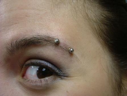 Silver Surface Barbell Eyebrow Piercing