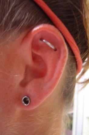 Stretched Lobe And Orbital Piercing Picture