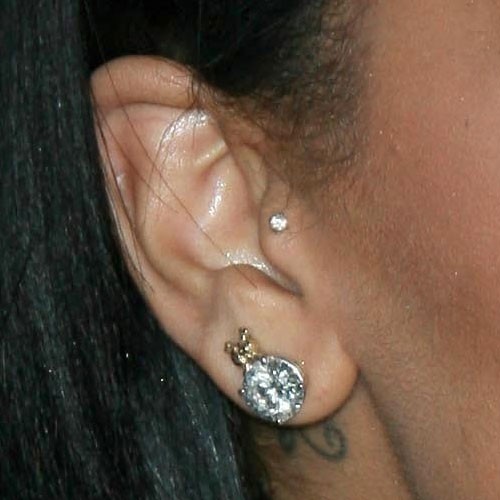 Tragus And Right Ear Lobe Piercing