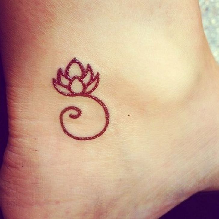 Tribal Buddhist Lotus Symbol Tattoo On Ankle
