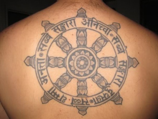 Unique Black Buddhist Symbol Tattoo On Man Upper Back