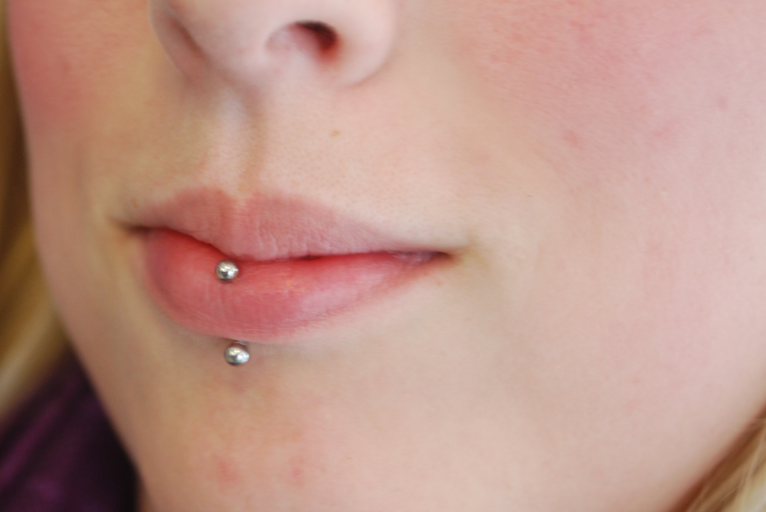 Vertical Labret Piercing Closeup Image