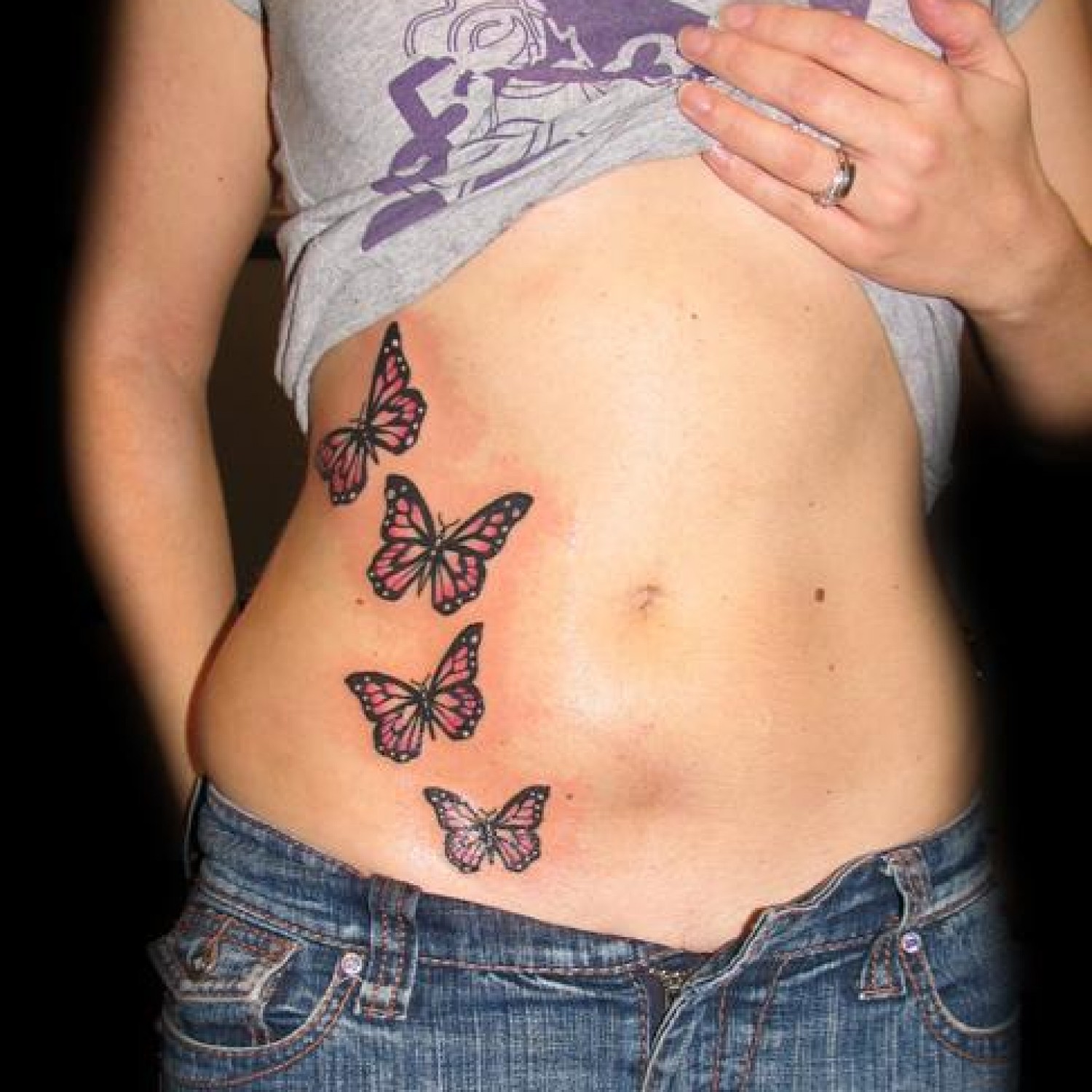 Amazing Four Butterflies Tattoo On Stomach