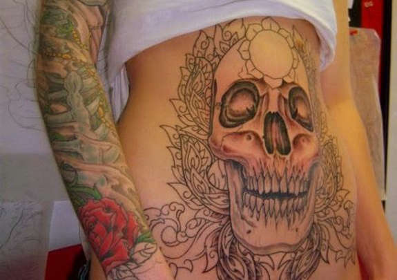 Amazing Skull Tattoo On Girl Stomach