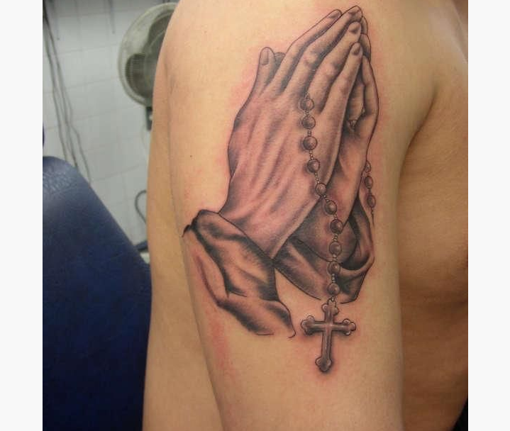Black And Grey 3D Rosary Cross In Praying Hands Tattoo On Shoulder
