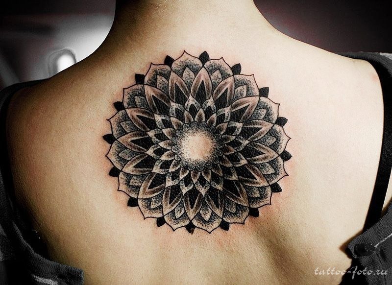 Black And Grey Dotwork Flower Tattoo On Girl Upper Back