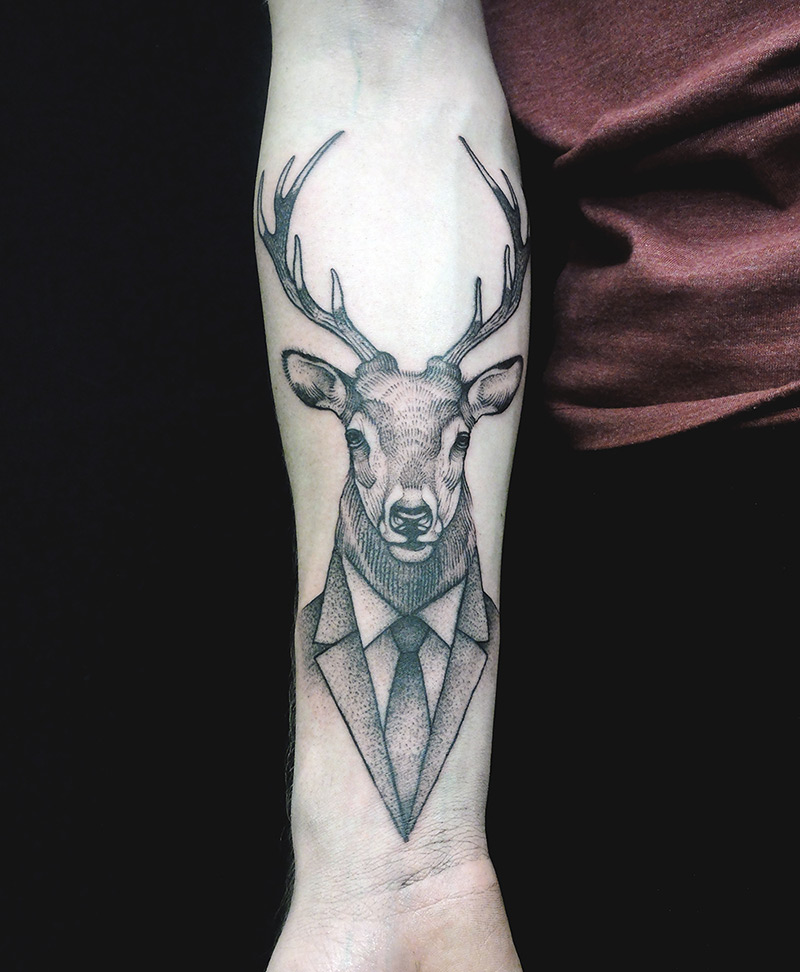 Black And Grey Geometric Deer Head Tattoo On Forearm