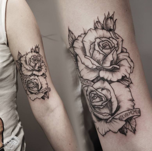 Black And Grey Two Roses Tattoo On Bicep