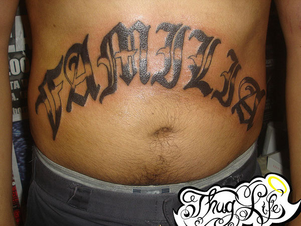 Black Familia Tattoo On Man Stomach