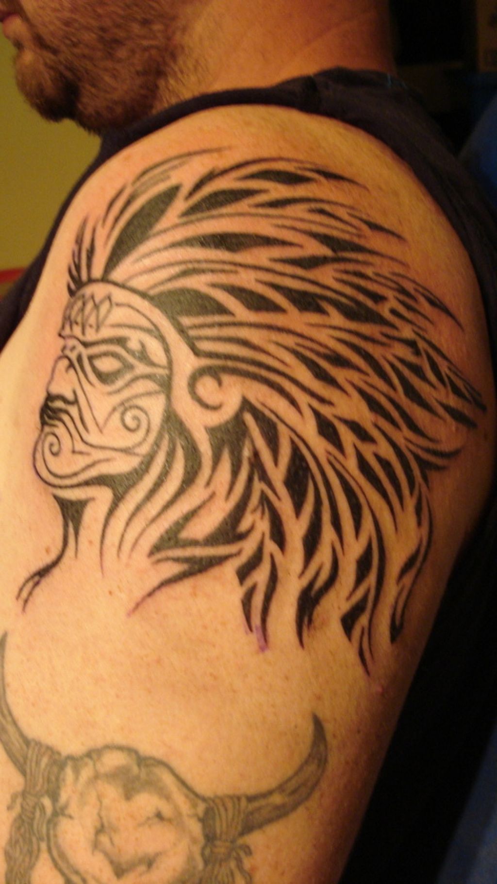 Black Indian Native Human Head Tattoo On Man Left Shoulder