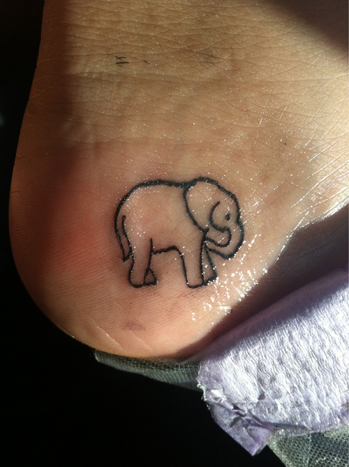 Black Outline Elephant Tattoo On Heel