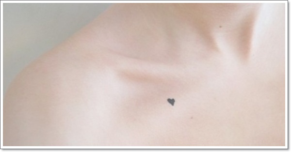 Black Tiny Heart Tattoo On Collarbone