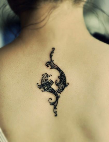 Black Unique Pisces Tattoo On Girl Upper Back