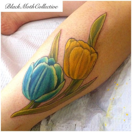 Blue And Yellow Two Tulip Tattoo Design For Leg