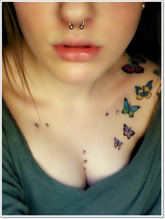 Colorful Flying Butterflies Tattoo On Girl Collarbone