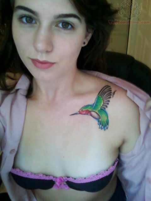 Colorful Hummingbird Tattoo On Girl Collarbone