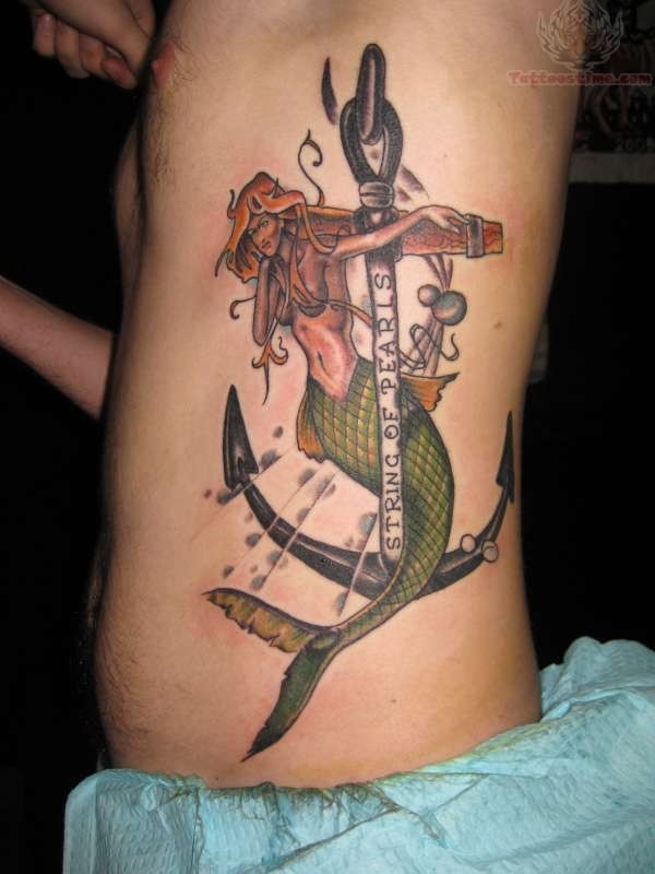 Colorful Mermaid With Anchor Tattoo On Man Side Rib