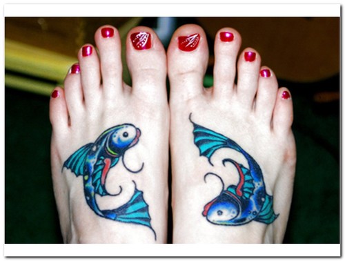 Colorful Pisces Tattoo On Girl Feet