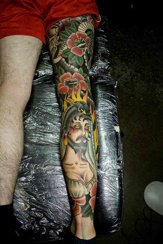 Colorful Traditional Tattoo On Man Full Leg