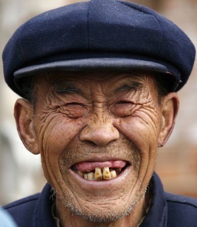 Crazy Old Man Smiling And Making Funny Face